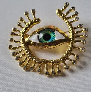 Goldtone Eye Brooch with Rhinestonesk79jlj Accents